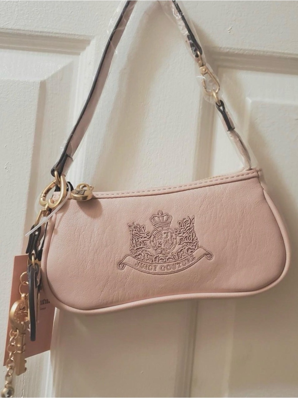 Juicy Couture Pale Pink Embossed Crest Mini Bag
